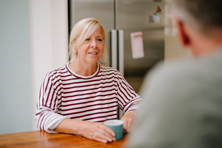 Woman with tea talking